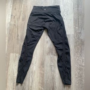 Lululemon black leggings with mesh criss cross details